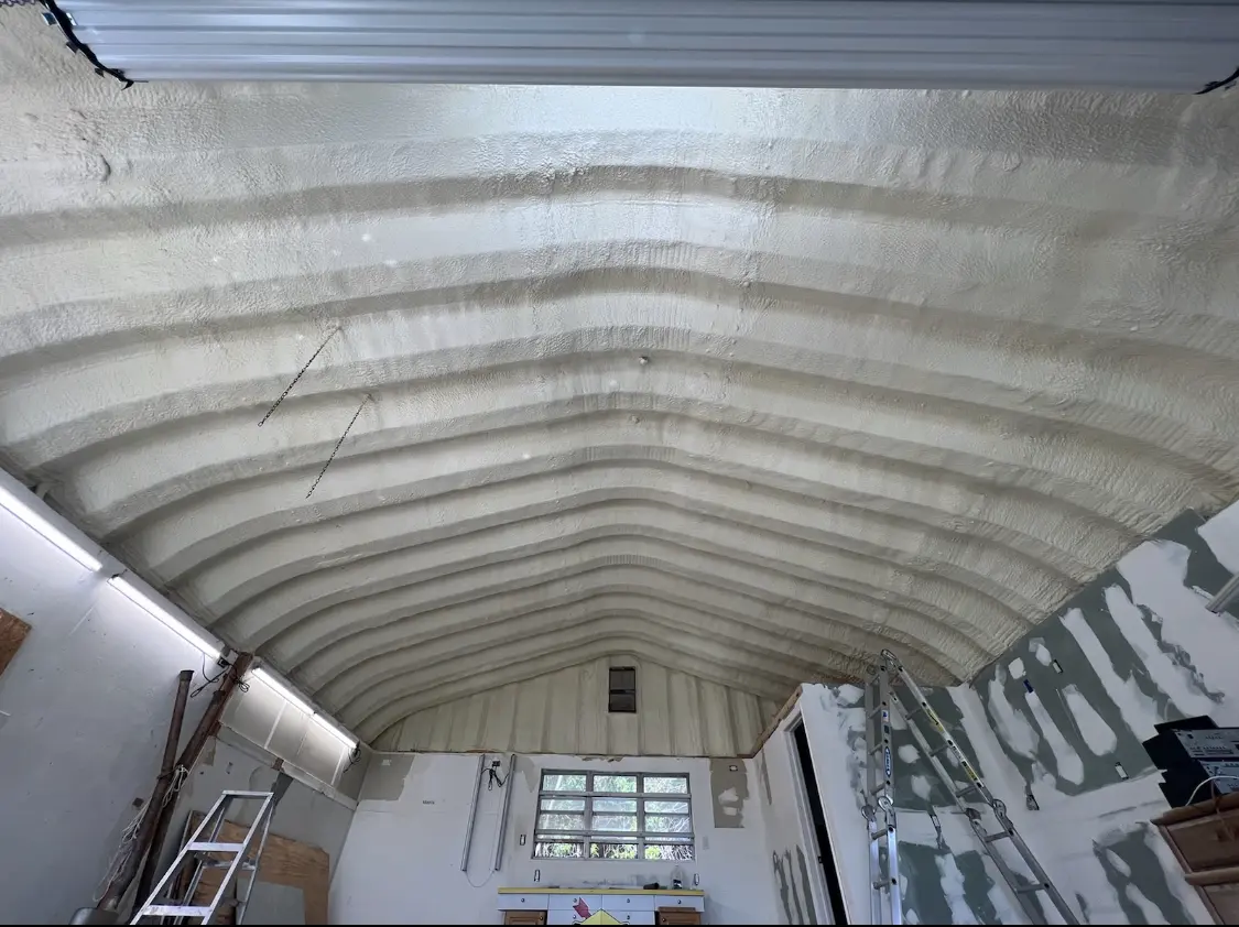 Spray polyurethane foam applied to the underside of a metal roof deck in Twin Lakes